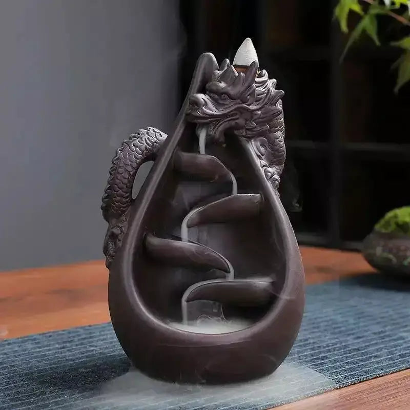 dragon incense burner, backflow incense holder, waterfall incense burner, ceramic incense burner, aromatherapy incense burner, backflow cone incense burner, relaxing incense holder, unique incense burner gift, home decor incense burner, incense burner for meditation, stress relief incense burner, decorative incense burner, incense burner with smoke waterfall, creative incense holder, incense burner for wellbeing
