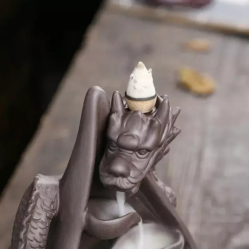 dragon incense burner, backflow incense holder, waterfall incense burner, ceramic incense burner, aromatherapy incense burner, backflow cone incense burner, relaxing incense holder, unique incense burner gift, home decor incense burner, incense burner for meditation, stress relief incense burner, decorative incense burner, incense burner with smoke waterfall, creative incense holder, incense burner for wellbeing