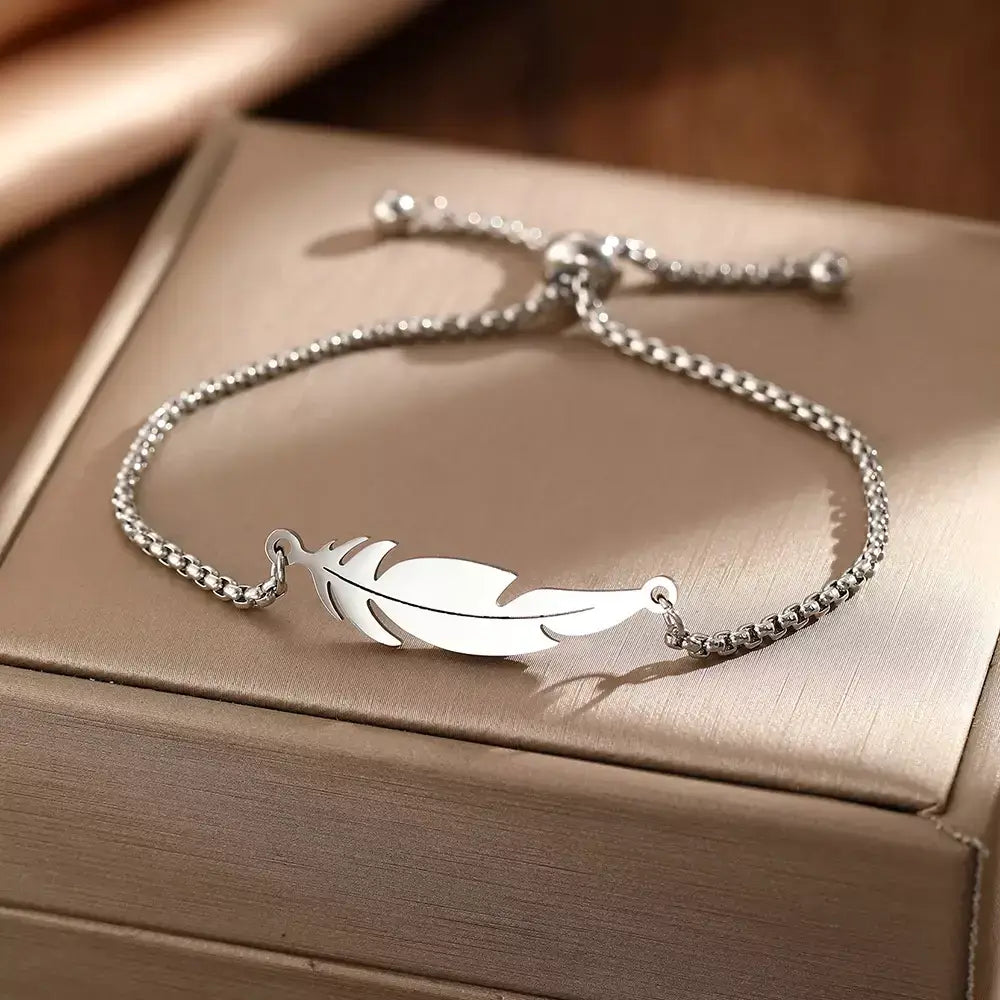 women’s elegant bracelete,
water-resistant women’s bracelet,
stylish women’s bracelete,
stainless steel women’s bracelet,
silver women’s bracelete,
rose gold bracelet women,
minimalist women’s bracelete,
feather charm bracelet,
fashion bracelet women,
adjustable bracelet for women