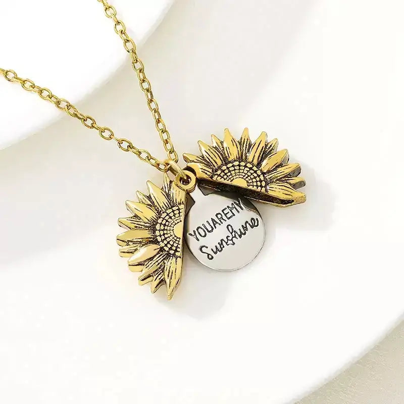 You Are My Sunshine – Sunflower Pendant Necklace,sunflower necklace, sunflower pendant, daisy chain necklace, floral pendant jewellery, friendship necklace, gift for best friend, meaningful necklace, engraved locket necklace, gift for her, sentimental gift for girlfriend, birthday gift for best friend, jewellery for loved ones, personalised necklace UK, heart necklace for her, boho necklace, bohemian jewellery, delicate pendant necklace, stainless steel necklace, everyday jewellery UK