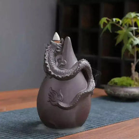 dragon incense burner, backflow incense holder, waterfall incense burner, ceramic incense burner, aromatherapy incense burner, backflow cone incense burner, relaxing incense holder, unique incense burner gift, home decor incense burner, incense burner for meditation, stress relief incense burner, decorative incense burner, incense burner with smoke waterfall, creative incense holder, incense burner for wellbeing
