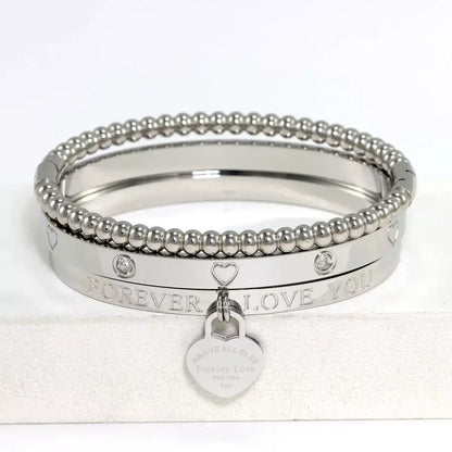 Love Heart Bracelet Set for women, stackable love heart bracelet, stainless steel heart bracelet gift, elegant jewellery for girlfriend, birthday gift bracelet for her, romantic love bracelet set, everyday women’s bracelet, Valentine’s gift jewellery for girlfriend, high-quality love heart bracelet, fashion bracelet for women UK, heart jewellery set for women, jewellery gift for her special occasion, premium love heart bracelet set