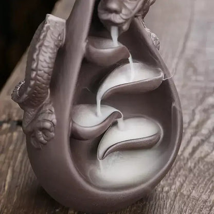 dragon incense burner, backflow incense holder, waterfall incense burner, ceramic incense burner, aromatherapy incense burner, backflow cone incense burner, relaxing incense holder, unique incense burner gift, home decor incense burner, incense burner for meditation, stress relief incense burner, decorative incense burner, incense burner with smoke waterfall, creative incense holder, incense burner for wellbeing
