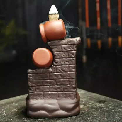 Auralis Flow Incense Holder,
Incense burner,
Backflow incense,
Ceramic incense holder,
Incense cone,
Yoga accessories,
Meditation tools,
Aromatherapy,
Home decor,
Relaxation,
Handmade