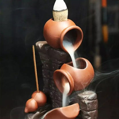 Auralis Flow Incense Holder,
Incense burner,
Backflow incense,
Ceramic incense holder,
Incense cone,
Yoga accessories,
Meditation tools,
Aromatherapy,
Home decor,
Relaxation,
Handmade