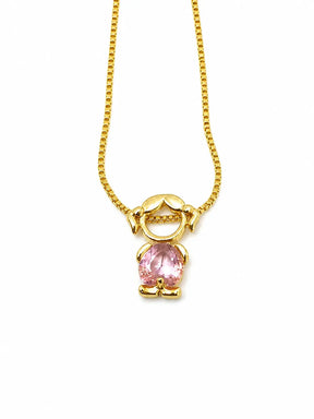 Gold-tone necklace with one girl figure pendant and a pink stone