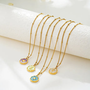Gold-tone satellite bead chains with enamel charm pendants