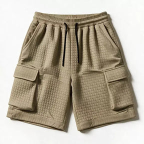 Khaki men's waffle cargo shorts with functional side pockets