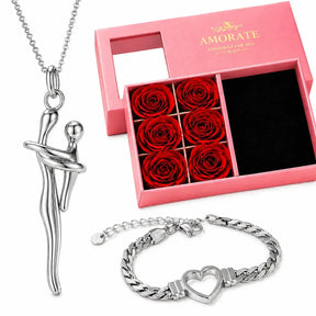 Silver mother and child embrace necklace with silver heart bracelet and pink Amorate rose gift box