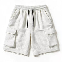 White men's waffle cargo shorts with cargo pockets and elasticated waist